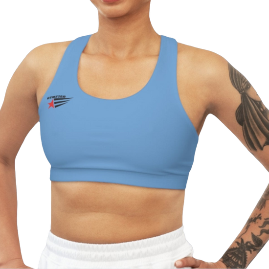 A woman wearing Carolina Blue,  sports, fitness bra from the Gimstar brand, with  a small logo on the left side. Front view.