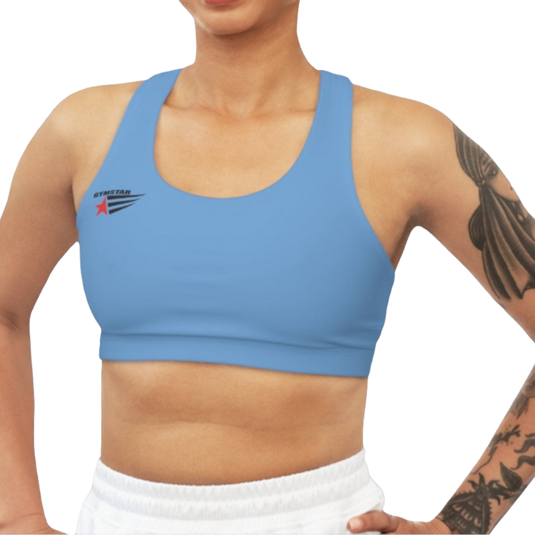 A woman wearing Carolina Blue,  sports, fitness bra from the Gimstar brand, with  a small logo on the left side. Front view.