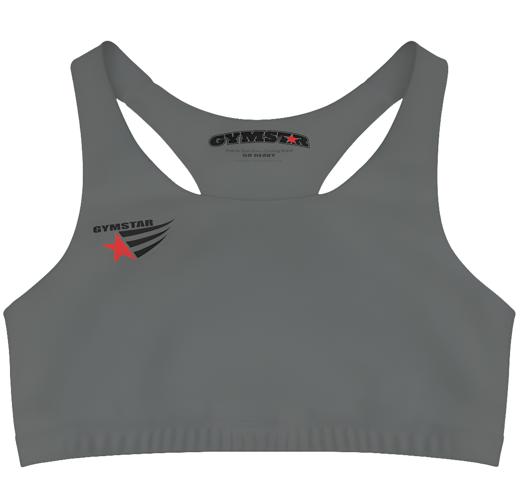 A women's solid grey athletic sports bra Gymstar. It has a scoop neckline and a racerback style. A logo with a red star and three black stripes is on the left chest, with the brand name "GYMSTAR" in black text above it. The main brand tag with "GYMSTAR" is visible on the inner back neckline.