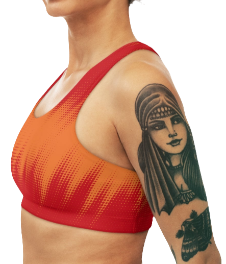 A women's athletic sports bra Gymstar. It is primarily red with a orange, dotted, gradient pattern that radiates from the sides and bottom. The straps are solid red. A small logo featuring a star and three red and blue stripes is on the left side of the chest. Leaft side view.