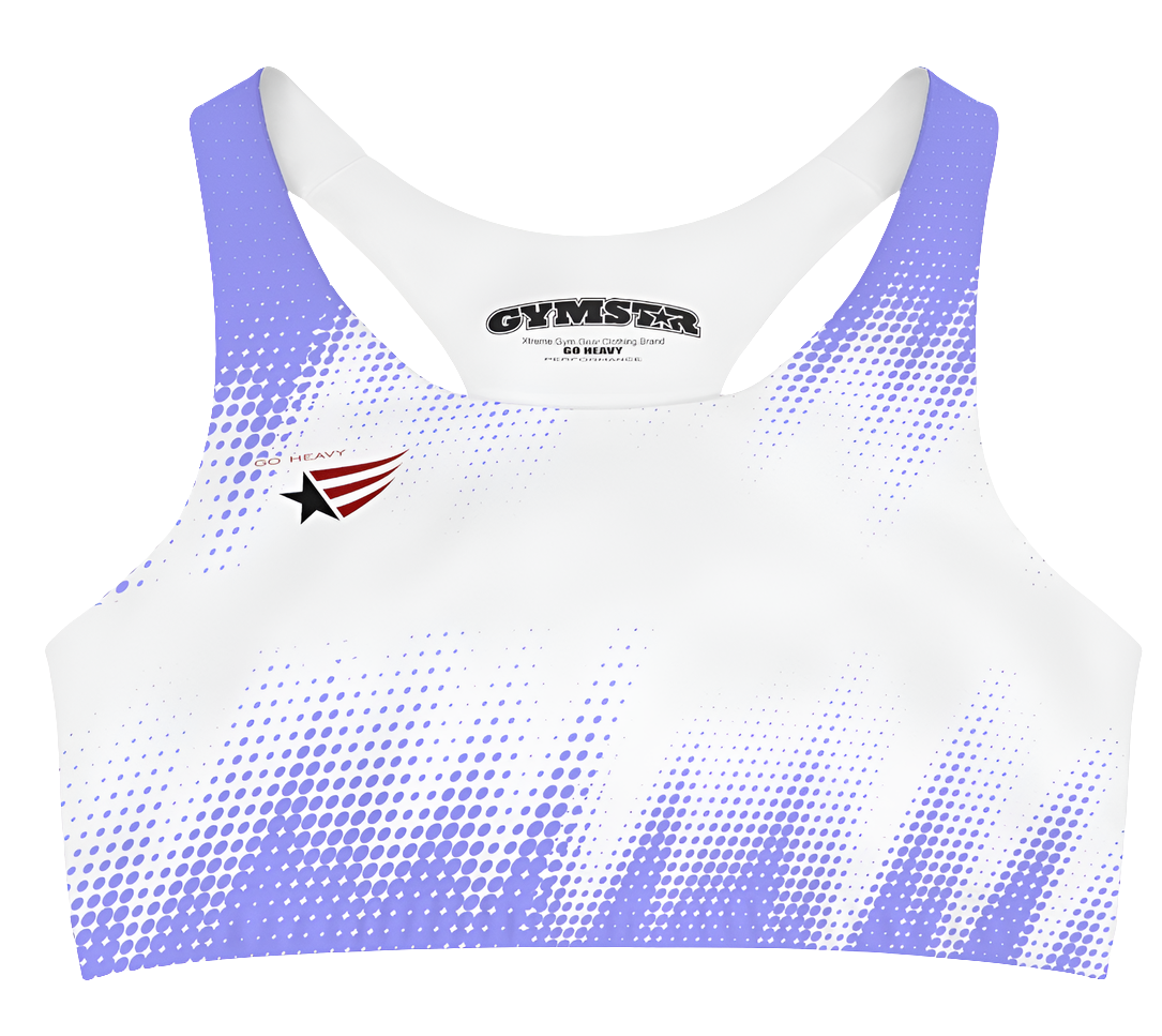 A women's athletic sports bra. It is primarily white with a blue, dotted, gradient pattern that radiates from the sides and bottom. The straps are solid blue. A small logo featuring a star and three red and blue stripes is on the left side of the chest.