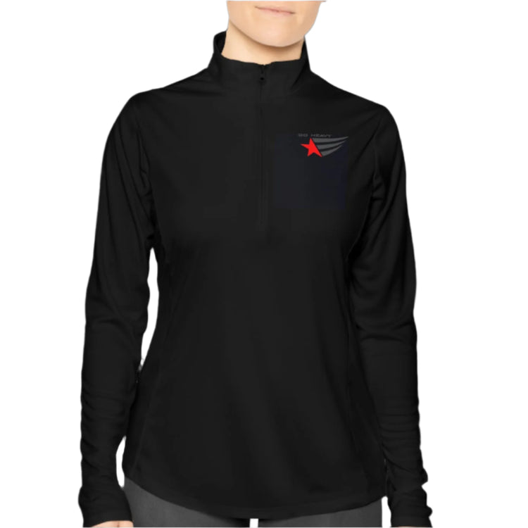 A person wearing a black half-zip sweatshirt with  logo printed on the front.