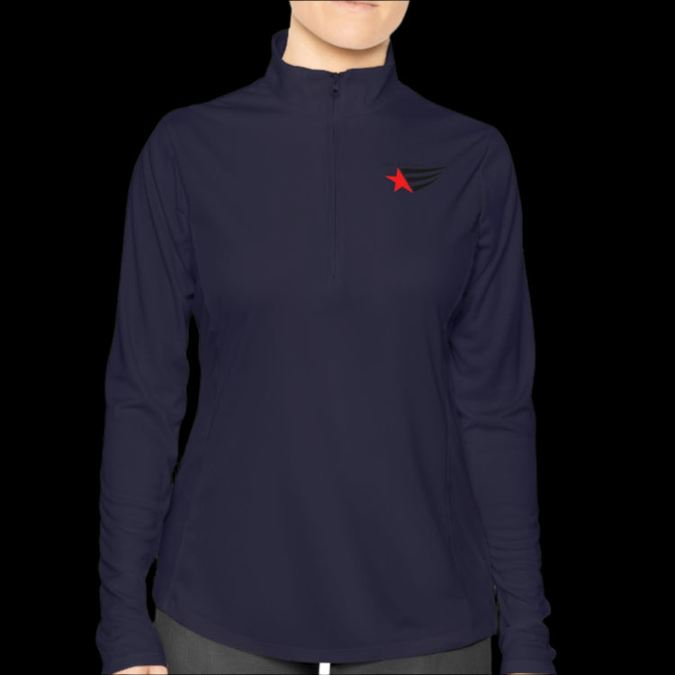 A person wearing a dark navy blue half-zip sweatshirt with  logo printed on the front.