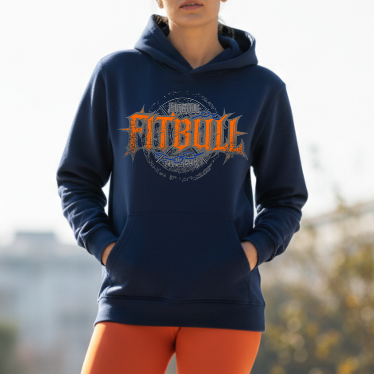 Woman wearing a navy hoodie with 'Fitbul' logo and orange leggings outdoors.