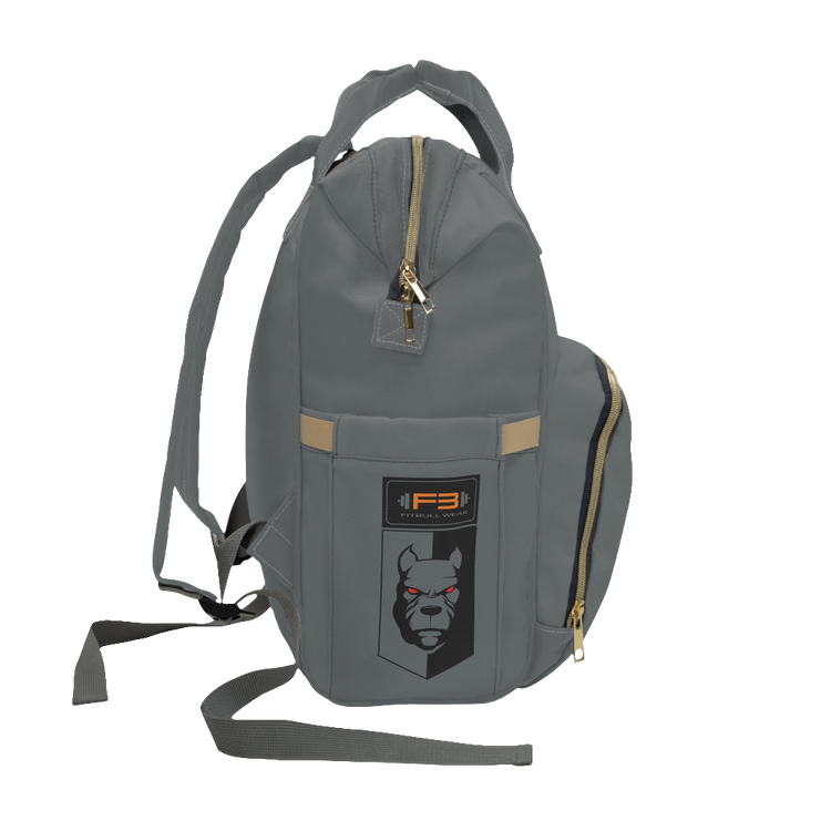 A gray FITBULL gym backpack with a logo that includes a stylized bull and the text 'FITBULL GYM', featuring multiple pockets and a padded shoulder strap design. Right side view.