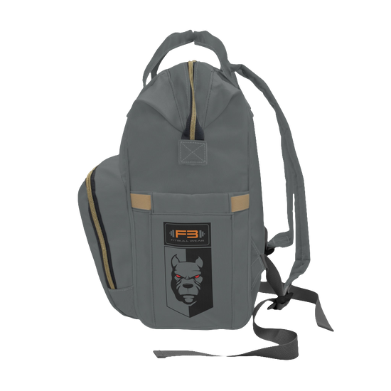 A gray FITBULL gym backpack with a logo that includes a stylized bull and the text 'FITBULL GYM', featuring multiple pockets and a padded shoulder strap design. Left side view.