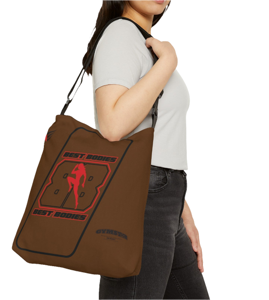 A person carrying a brown tote bag with 'GYMSTAR' branding and a graphic Best Bodies design that includes a silhouette of a person lifting weights.
