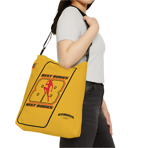 A person carrying a yellow tote bag with 'GYMSTAR' branding and a graphic Best Bodies design that includes a silhouette of a person lifting weights.
