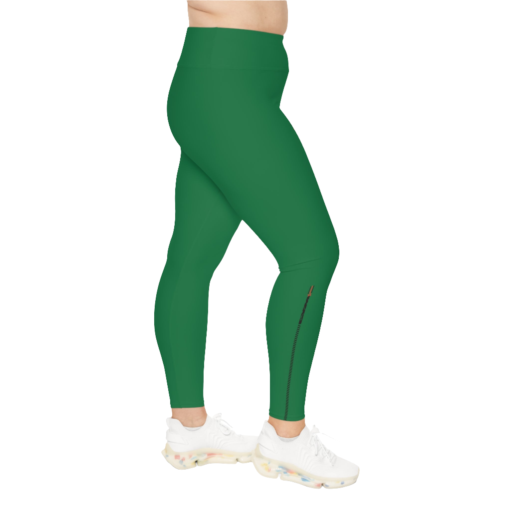 A woman wearing green high-waisted fitness leggings Gymstar with a logo on the waistband, paired with white sneakers. Right side view.