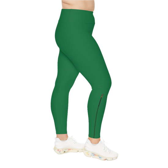 A woman wearing green high-waisted fitness leggings Gymstar with a logo on the waistband, paired with white sneakers. Right side view.