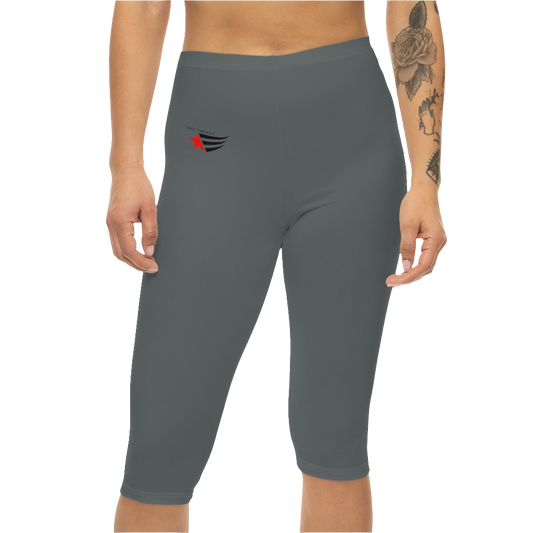 A woman wearing pair of gray Gymstar brand fitness leggings featuring a mid-rise waist and a logo, designed for yoga and other workouts. Front close up view.