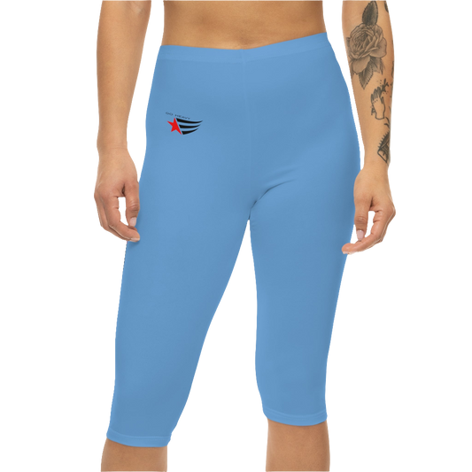 A woman wearing pair of blue fitness Gymstar leggings with a small logo on the upper left thigh area, designed for women's workouts. Front close up view.
