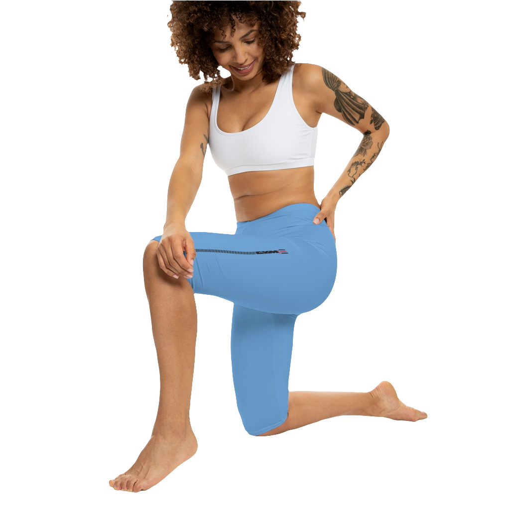 A woman wearing pair of blue fitness Gymstar leggings with a small logo on the upper left thigh area, designed for women's workouts. Front action view.
