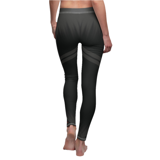 A female fitness model wearing pair of gray Gymstar women's fitness leggings with capri cut, featuring white seam stitching and a mid-rise waist. Rear close up view.    