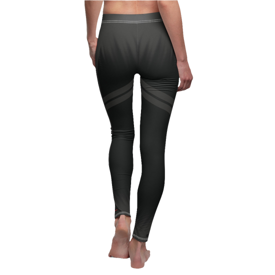 A female fitness model wearing pair of gray Gymstar women's fitness leggings with capri cut, featuring white seam stitching and a mid-rise waist. Rear close up view.    