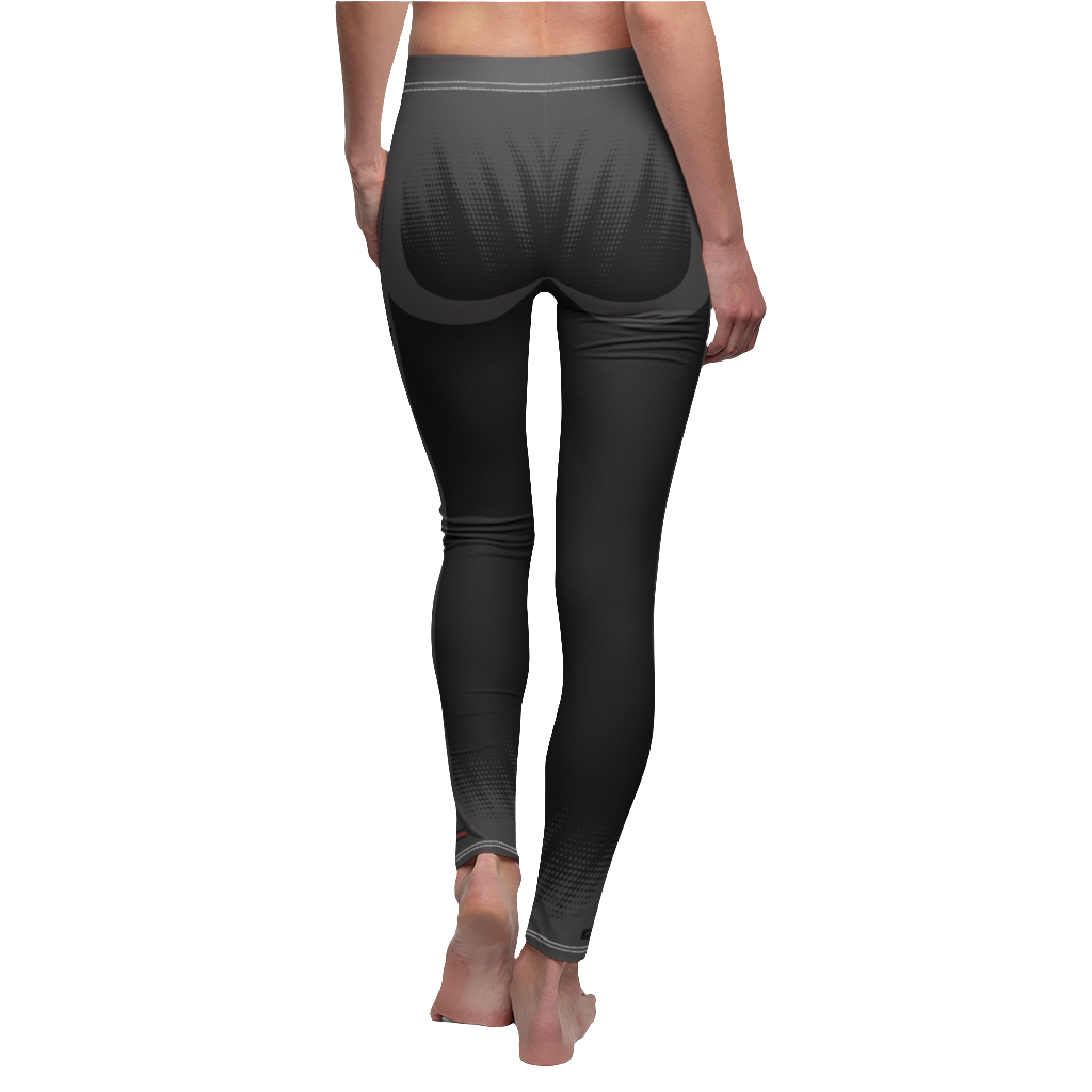 A female fitness model wearing pair of black Gymstar women's fitness leggings with capri cut, featuring white seam stitching and a mid-rise waist and art design.  Rear close up view.   