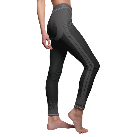 A female fitness model wearing pair of black Gymstar women's fitness leggings with capri cut, featuring white seam stitching and a mid-rise waist and art design.  Right side close up view.    