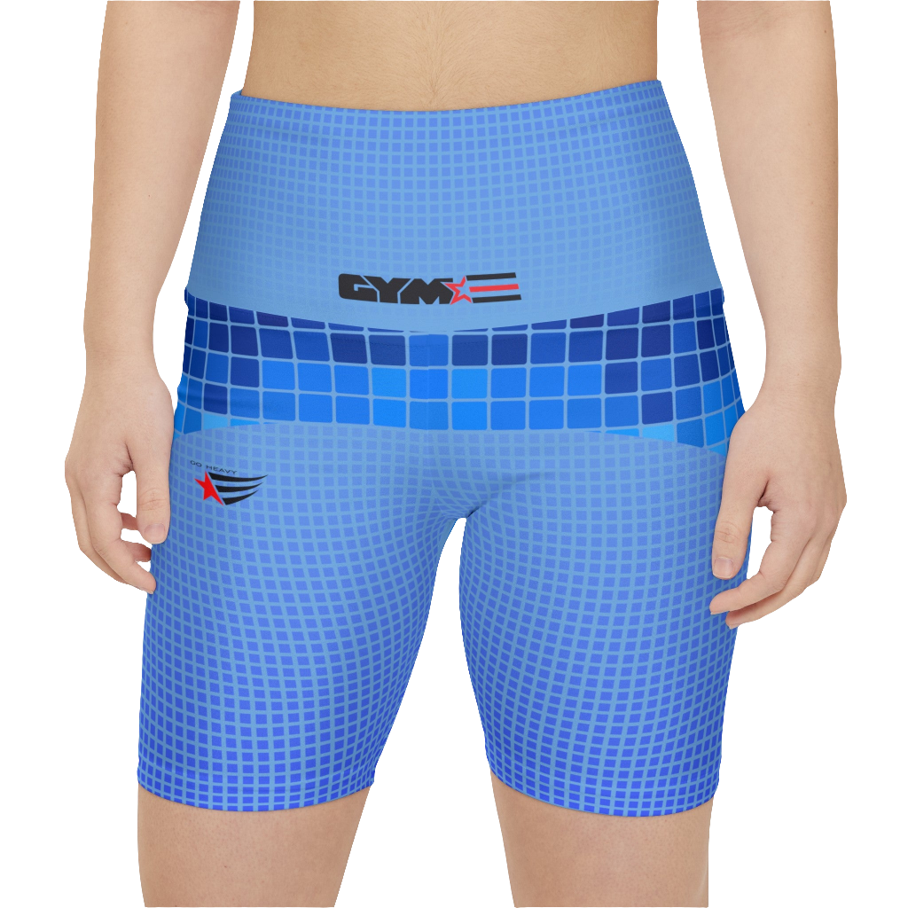 A woman wearings blue patterned GYMSTAR shorts with branding logo. Front close up vew.