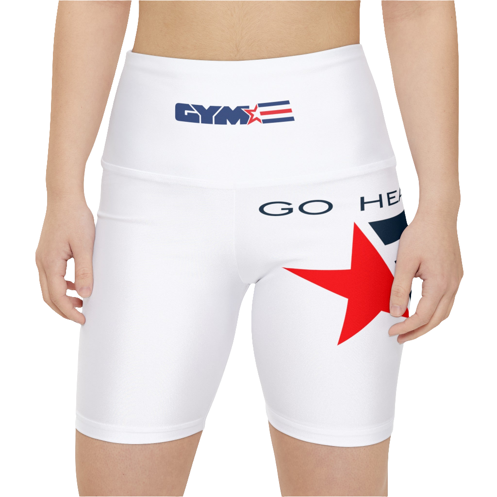 A woman waering pair of white Gymstar workout leggings with a blue and red star design on the side, featuring the logo on the elastic waistband. Front close up view