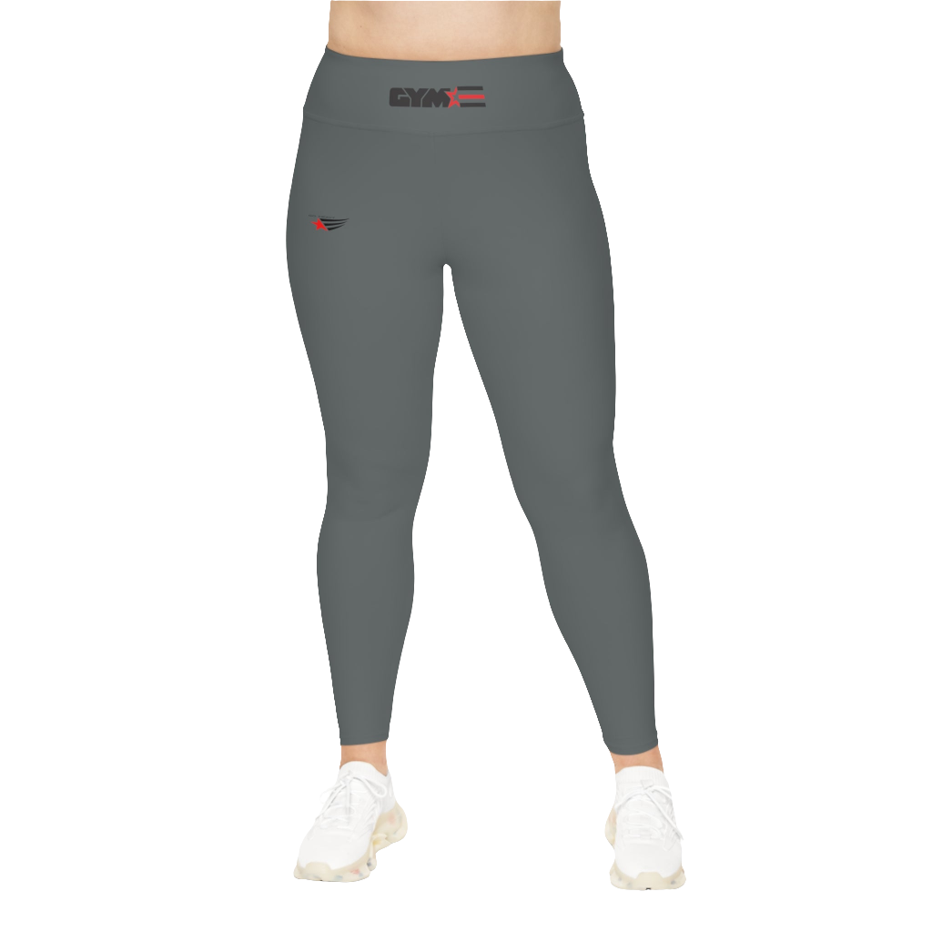 A woman wearing pair of grey high-waisted Gymstar fitness leggings with a logo on the upper left thigh, paired with white sneakers. Front view.