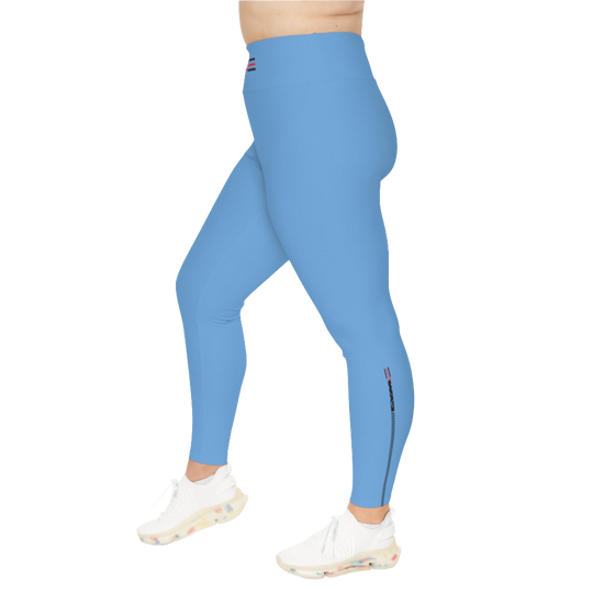 A woman wearing blue high-waisted fitness leggings with a Gymstar logo on the waistband, standing upright with a neutral expression. Right isde view.