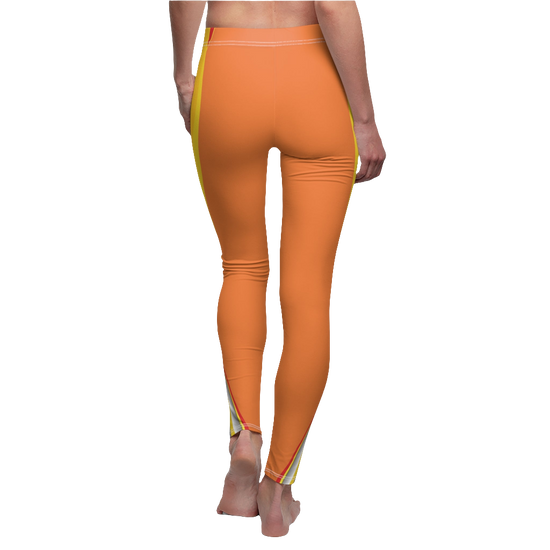 A pair of orange fitness leggings for women, with a high waist and a visible brand logo on the left thigh. Back side view.