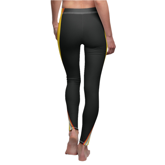 A pair of black Gymstar yoga leggings for fitness, with a colorful stripe design on the side, featuring a high waist cut. Back side view.
