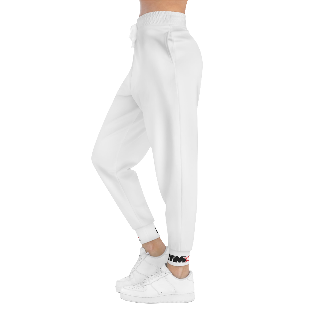 A person standing sideways, wearing silver gray joggers Gymstar with a logoand white sneakers. The joggers have a ribbed bottom and waistband cuffs, and feature two side pockets.