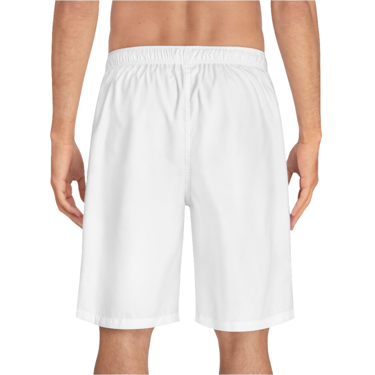 A man wearing pair of white men's board shorts with a small Gymstar logo on the left leg back side view.