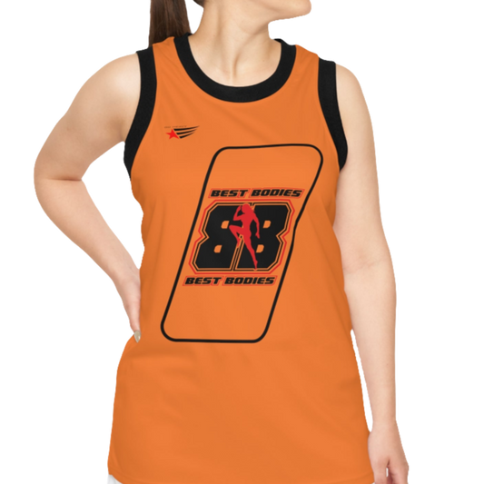 A woman with a fitness body is wearing an orange Gymstar sports tank top branded with the Gymstar Fit logo and a motivating print.