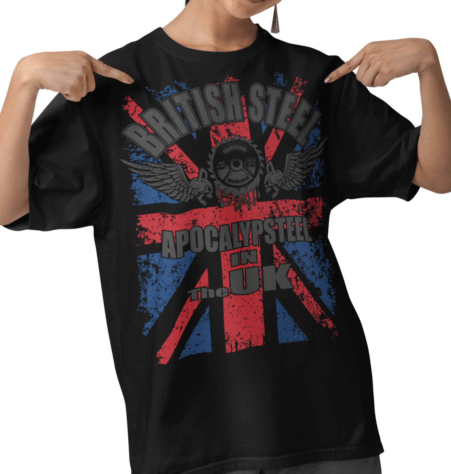 A person wearing a black Gymstar t-shirt with a graphic design including the British flag and text "British Steel Apocalipsteel in The UK", indicating a fitness or bodybuilding theme.