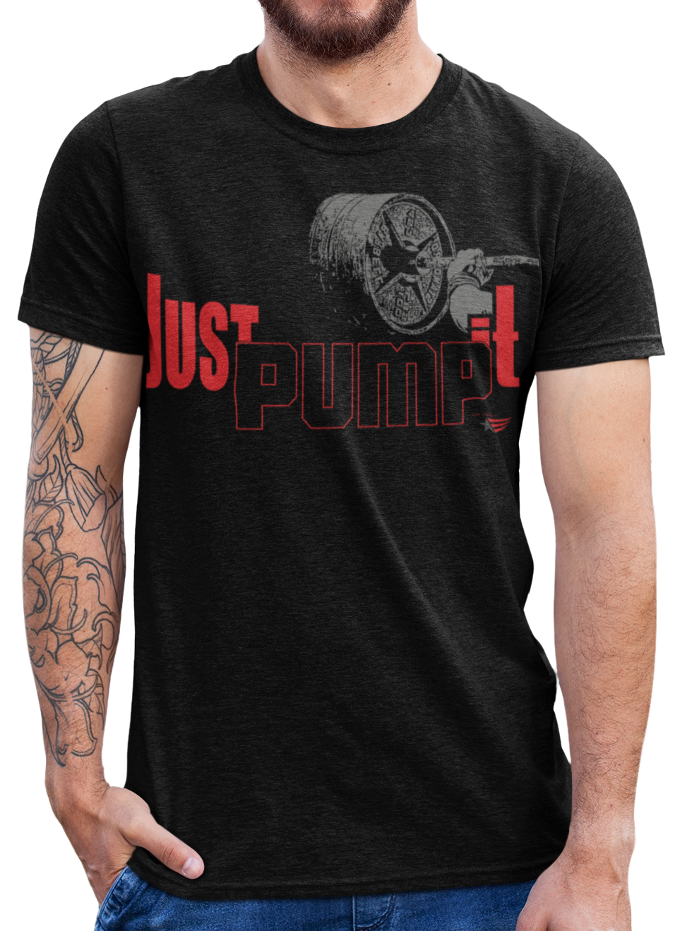 А man wearing sporty, black cotton Gymstar fitness t-shirt Just Pump It with a motivating design of a hand holding a barbell. Close-up front view.