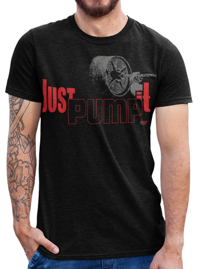 А man wearing sporty, black cotton Gymstar fitness t-shirt Just Pump It with a motivating design of a hand holding a barbell. Close-up front view.