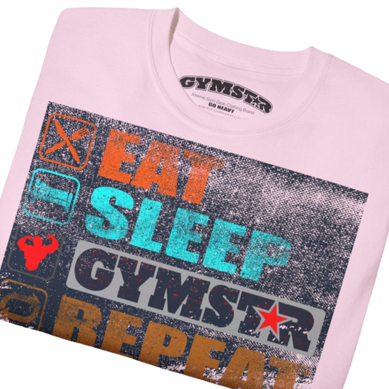 A pink sports t-shirt from Gymstar with a modern and motivational design. The chest features a large, colorful print with "EAT," "SLEEP," "GYMSTAR," and "REPEAT" text, each with an icon. This t-shirt is perfect for anyone living a fitness lifestyle and looking for comfortable and stylish apparel for workouts or daily wear. Close up view.