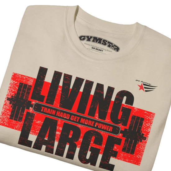 Gymstar beige t-shirt, designed for heavy workout enthusiasts. The chest features a large, distressed print depicting a barbell and motivational text. The "LIVING LARGE" text is a standout red color, and the "TRAIN HARD GET MORE POWER" message makes it a perfect choice for weightlifting and gym training.