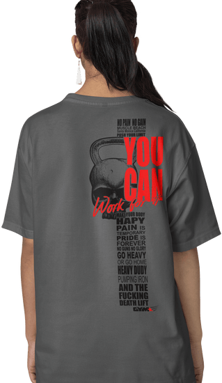 The image shows the back of a woman wearing a gray sports t-shirt Gymstar with the text 'YOU CAN' and a graphic of a Skull Kettlebell.