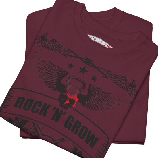A rubin Gymstar workout tee with a black graphic that reads 'Rock And Grow',  barbell and logo, presumably bodybulding or fitness. Close up view.