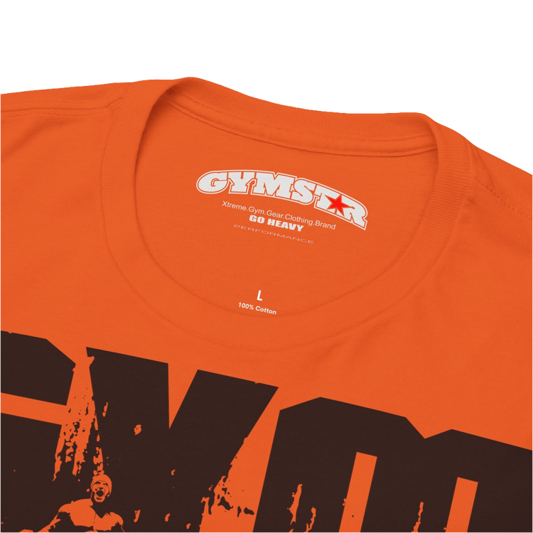 A orange Gymstar workout tee with a black graphic that reads 'GYM',  bodybuilder silhouettte and logo, presumably bodybulding or fitness.   Logo Close up view.