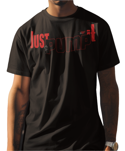 A person wearing a black graphic t-shirt with the text 'JUST PUMP' in red and white on the front.
