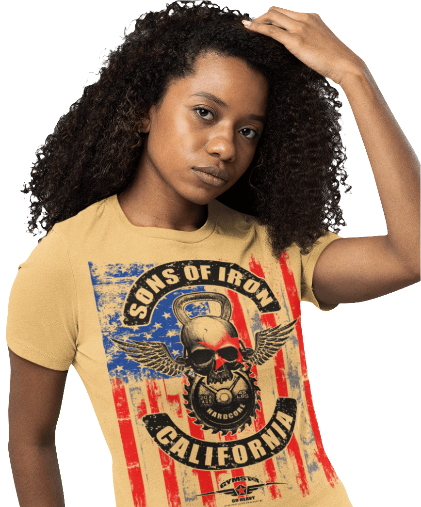 A woman wearing black Gymstar tee with a red, blue and black graphic that reads 'Sons Of Iron', skull-kettlebell, barbell and logo, presumably bodybulding or fitness. 