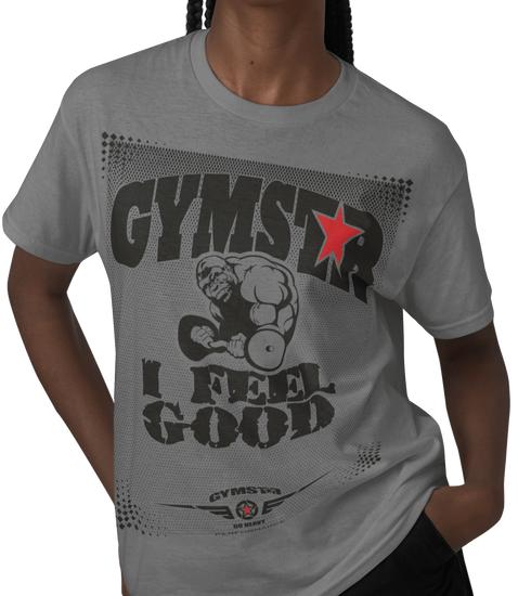 A woman wearing silver grey  Gymstar t-shirt with a graphic print that includes text I Feel Good, Gorila lifting barbel and a logo related to fitness and bodybuilding.