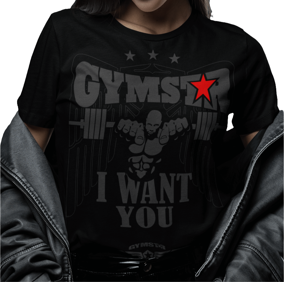 A woman wearing black Gymstar t-shirt with the text 'I WANT YOU' printed on the front, along with graphics of a weightlifter and dumbbells. 