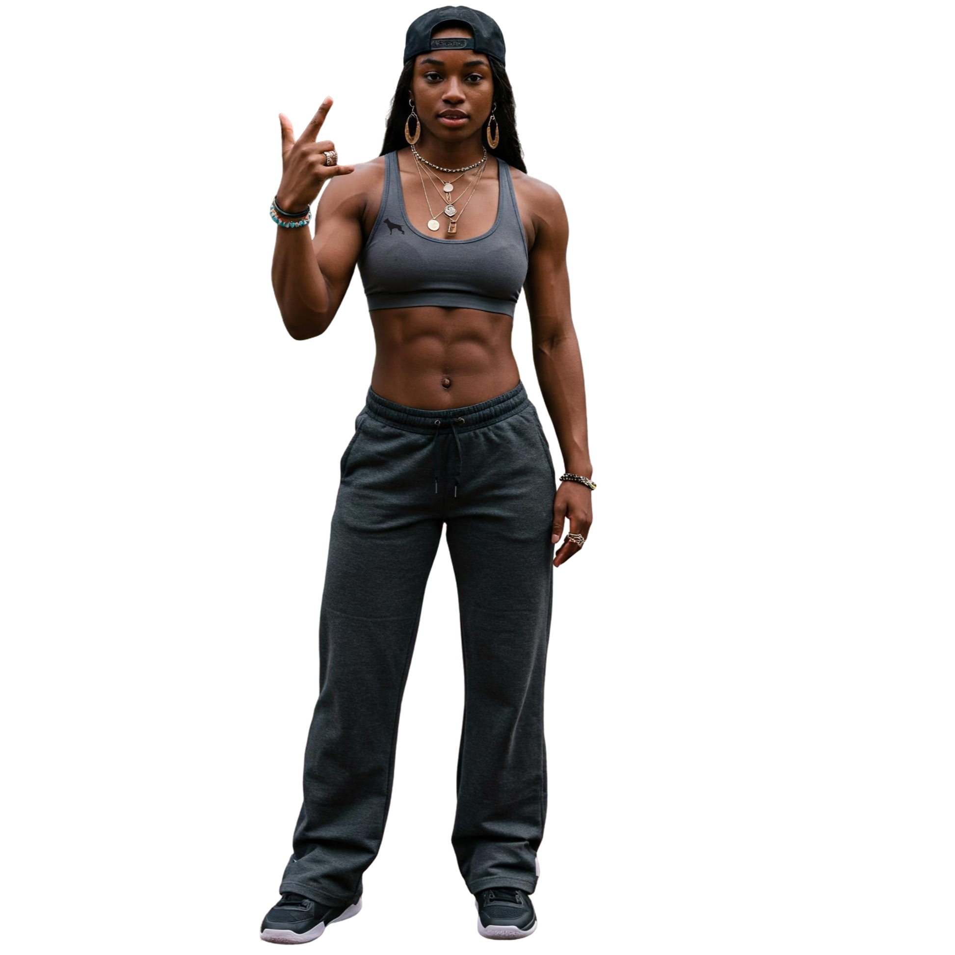Person wearing a gray sports Fitbull bra and pants on a white background